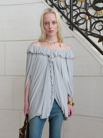 Ruffled cape-draped top