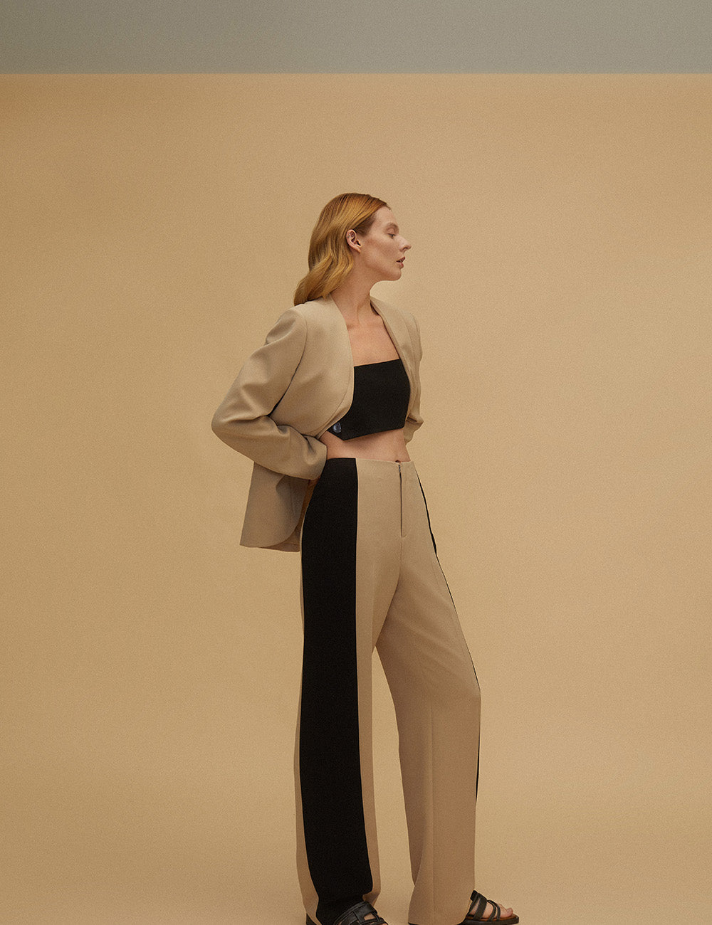 Interspersed with contrast color collarless suits